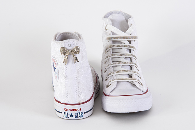 converse bianche strass testo