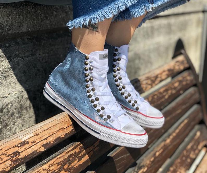 converse bianche intrecciate jeans