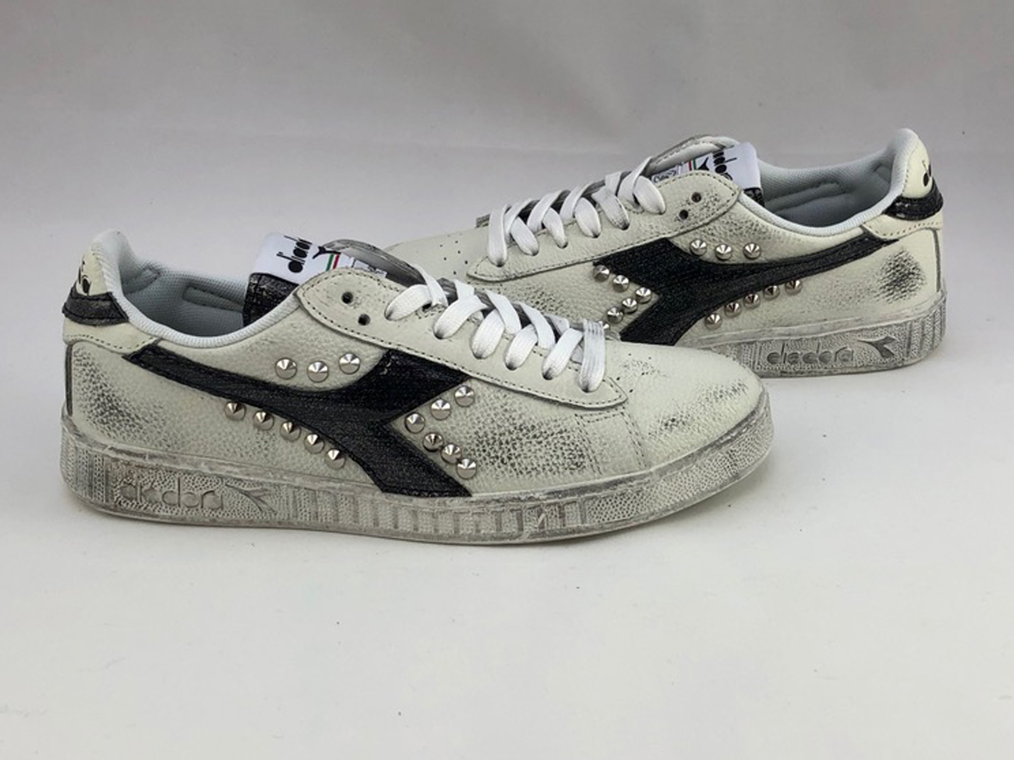 scarpe diadora con borchie