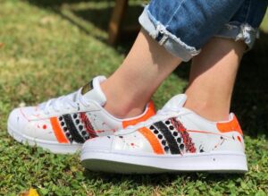 Adidas cheap superstar arancione