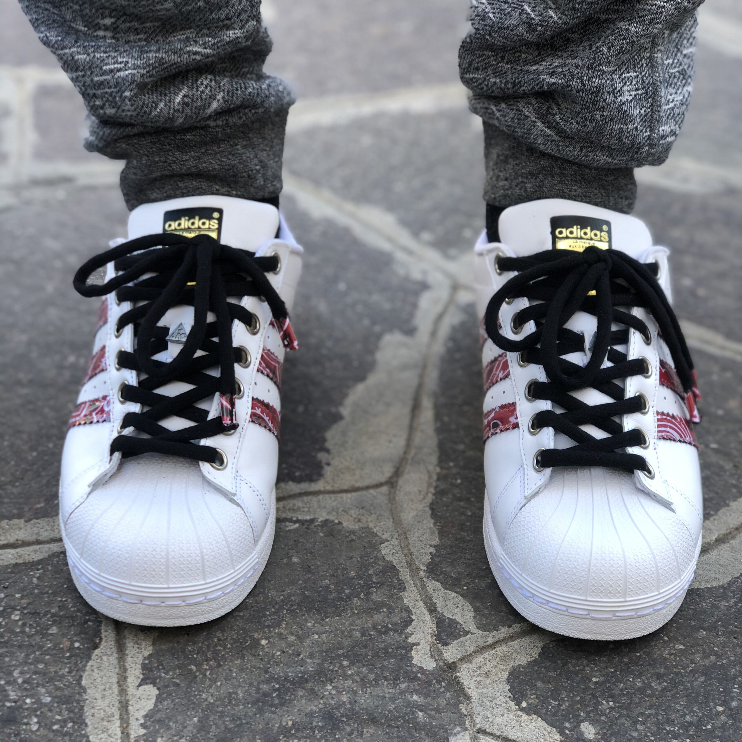 Adidas superstar rosse uomo 2025