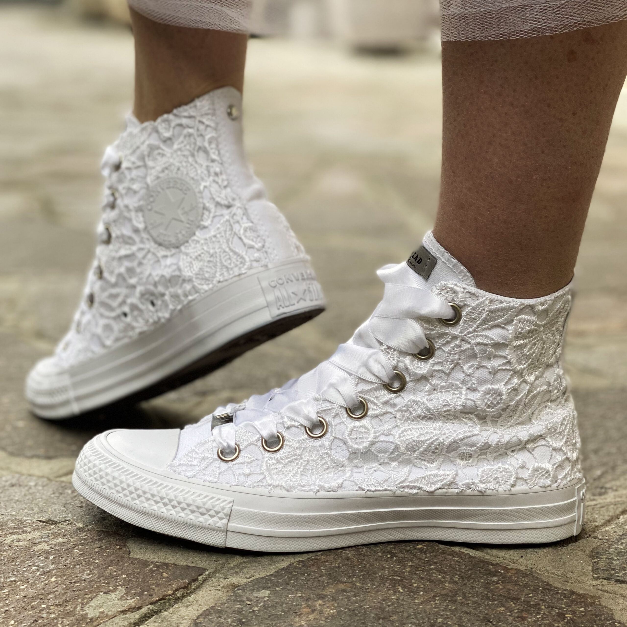 converse bianche basse trovaprezzi