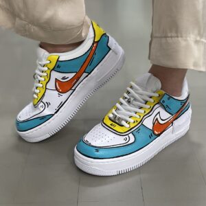 Nike Air Force 1 Shadow Custom Cartoon Azzurro, Giallo e Swoosh Arancio